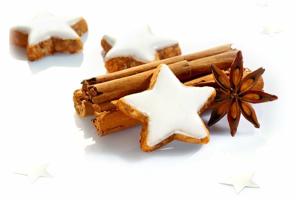 Christmas cookies with cinnamon on the background