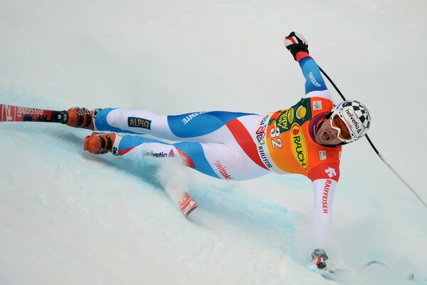 The fall of a skier at speed on the snow