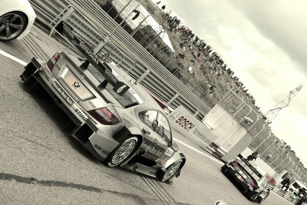 Black and white photo of a racing car