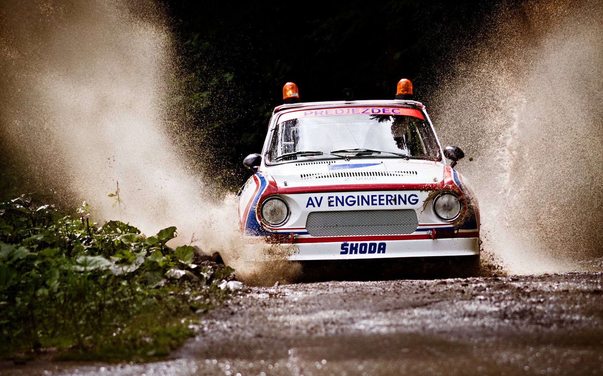 rally seguridad del coche rally charco salpicaduras