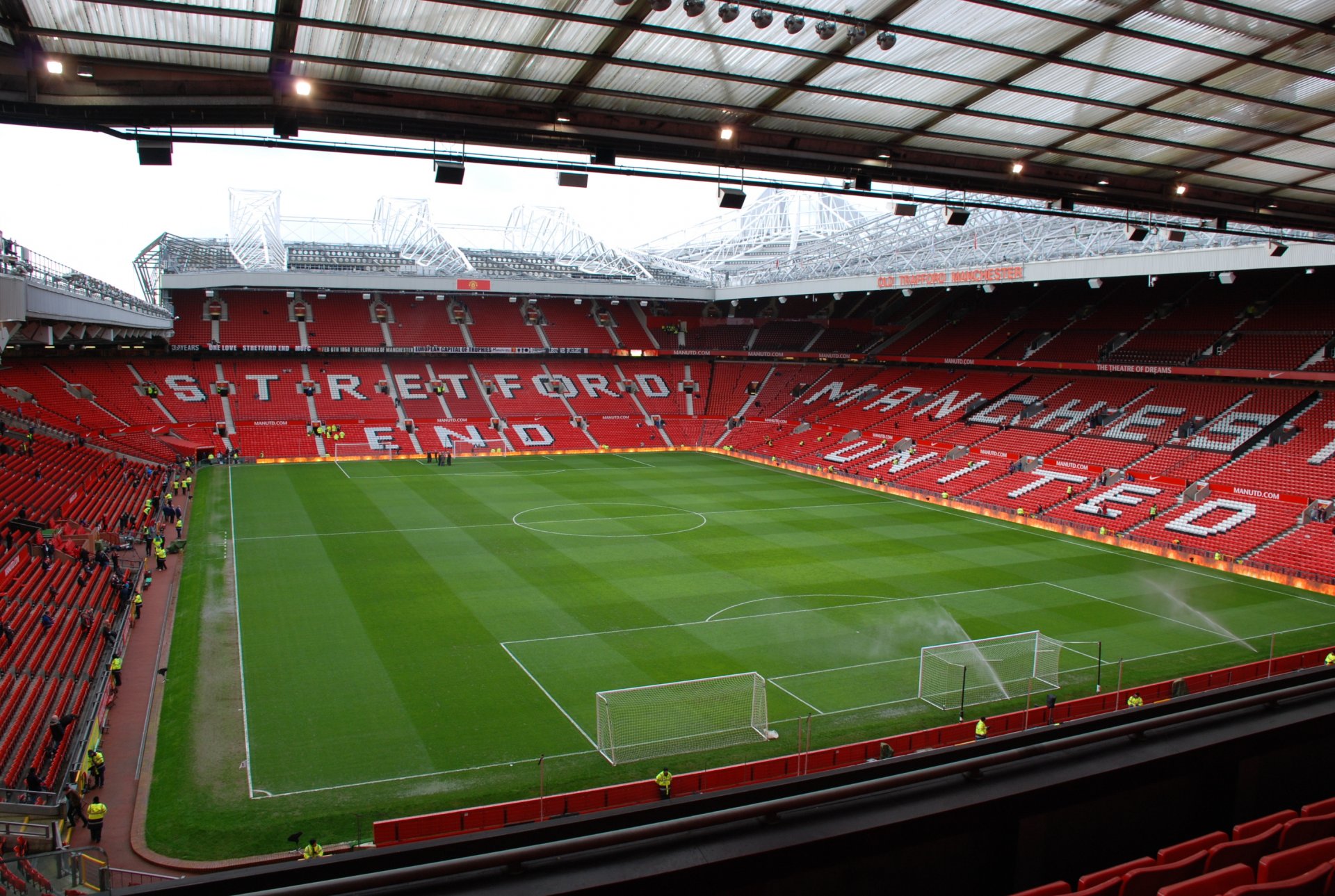 football stadium old trafford watered prepared