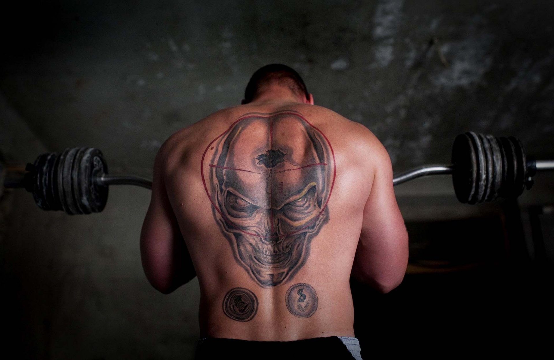 barbell tangon crâne tatouage