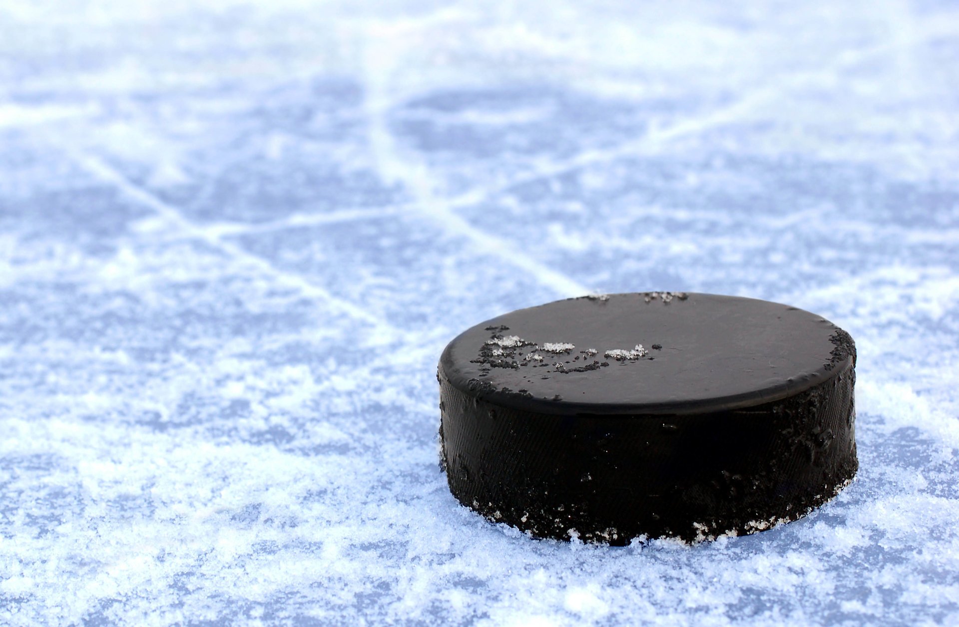 hockey ice stripes from black on puck ice