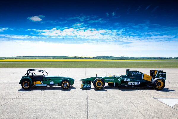 Formula 1 car on the background of the sky and the track