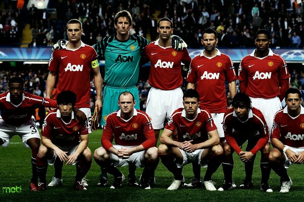 Squadra del Manchester United sul campo di calcio