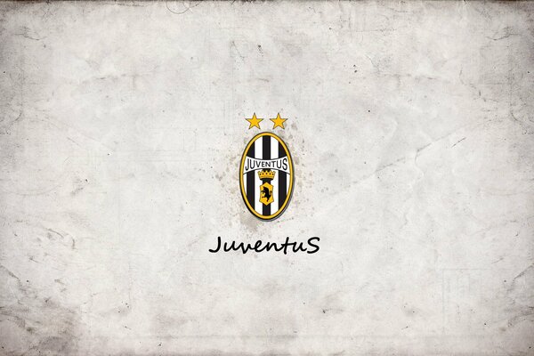 The logo of the Juventus football team on a gray background