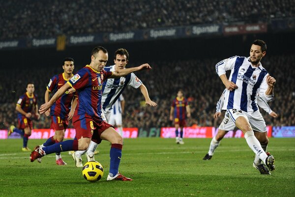 Terrain de football avec le jeu du Club de Barcelone