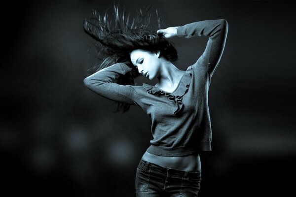Black and white photo of a girl dancing