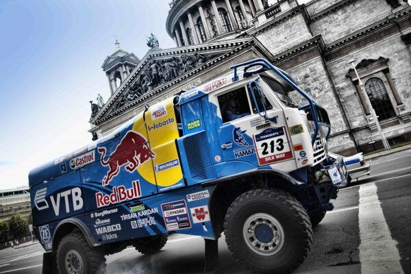 A car with ads for Red Bull and VTB