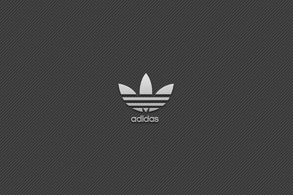 Adidas Marke Emblem - Kleeblatt auf grauem Hintergrund