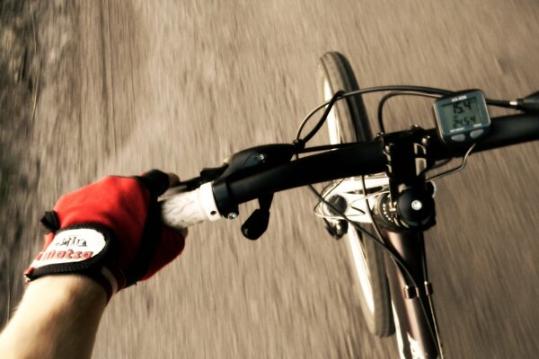 A cyclist gaining speed