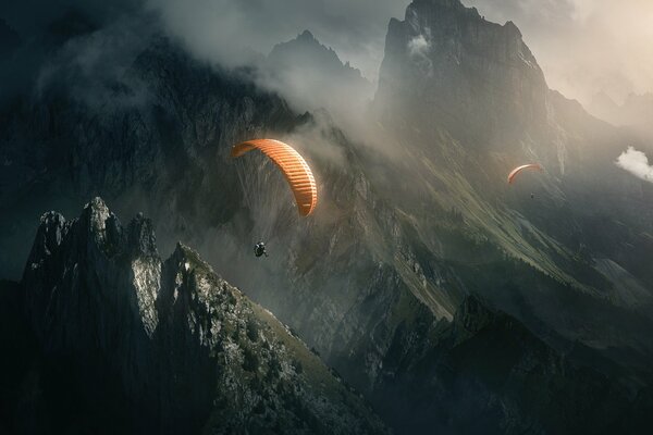 Parachute jump into a mountainous area