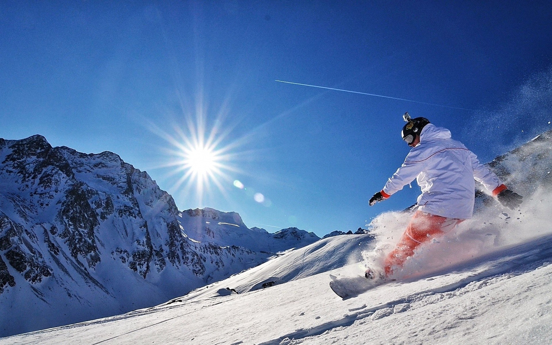 adrénaline soleil neige snowboard retournement montagnes