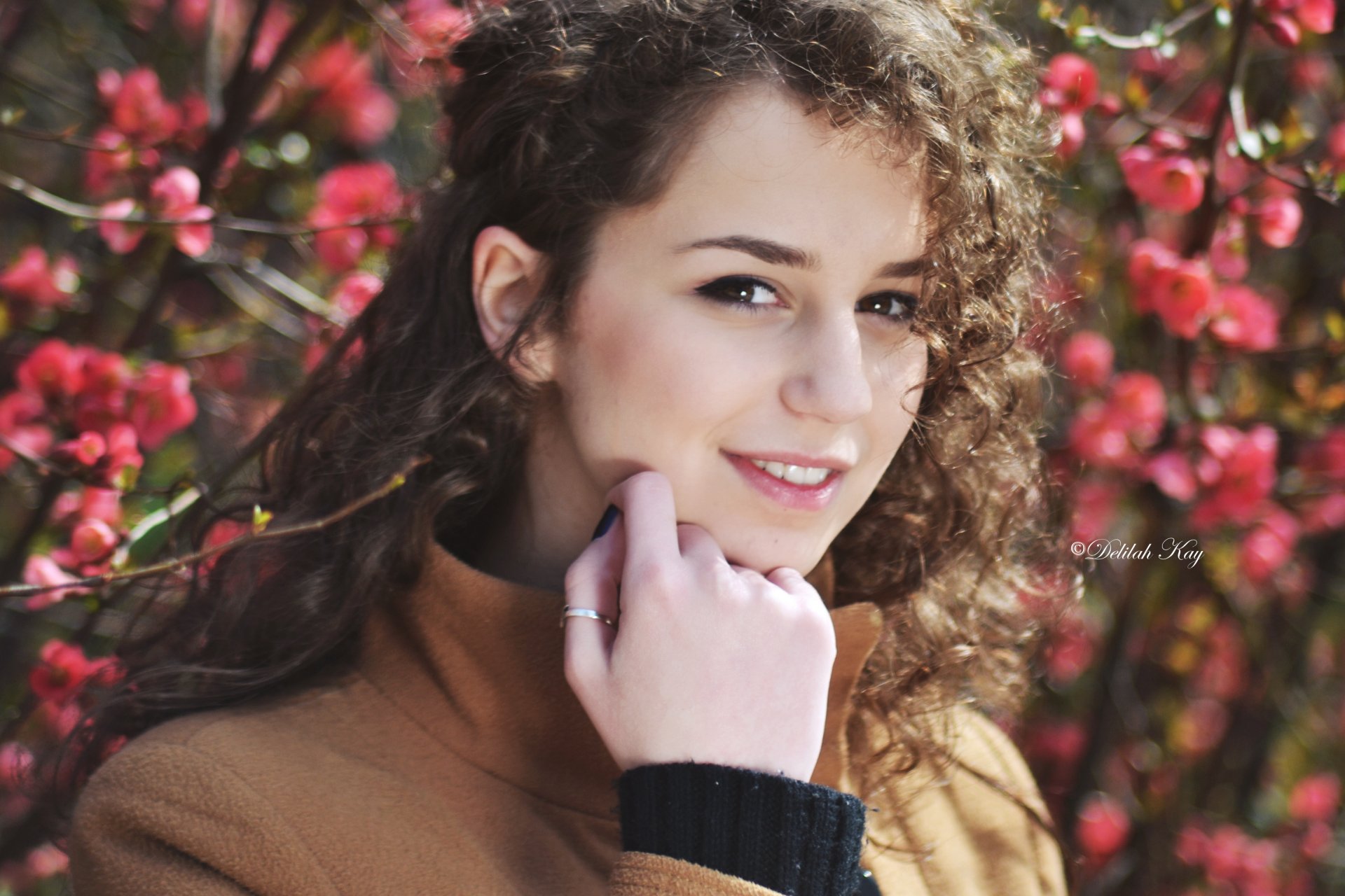 girl brown-eyed brown hair view ring curls flower spring branche