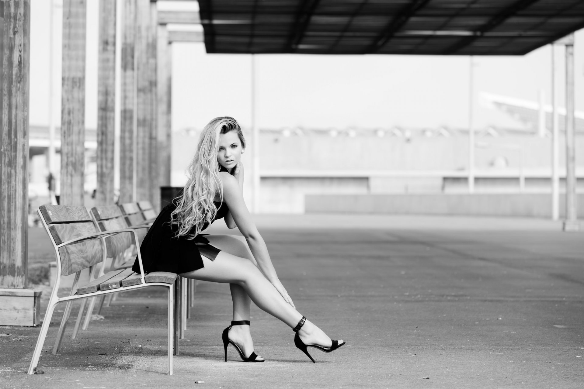 blonde black and white dress pose street sitting