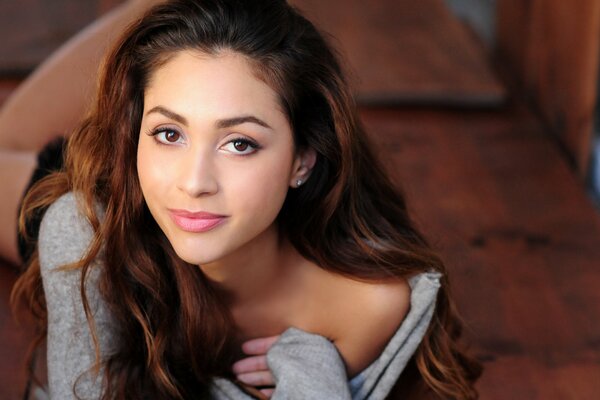 Brown-eyed actress Lindsay Morgan with her hair down