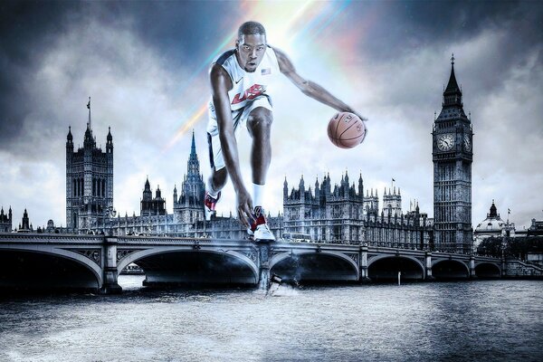 A basketball player with a ball on the background of a river in London