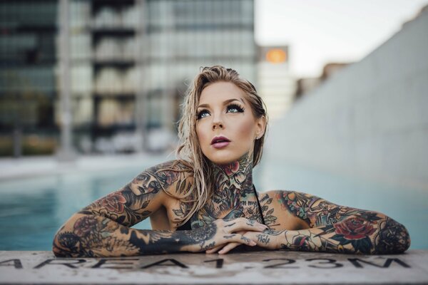 Beautiful tattooed girl with piercing