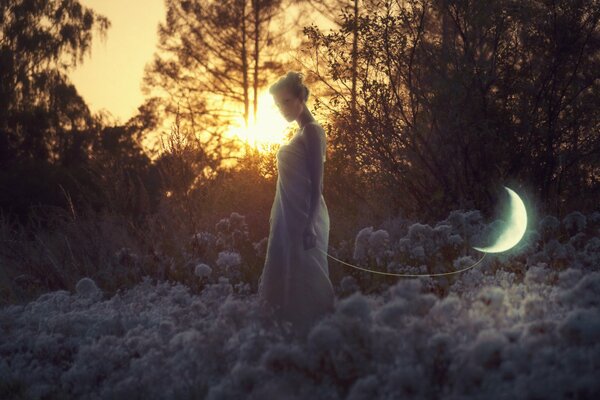 The moon on a string following the girl