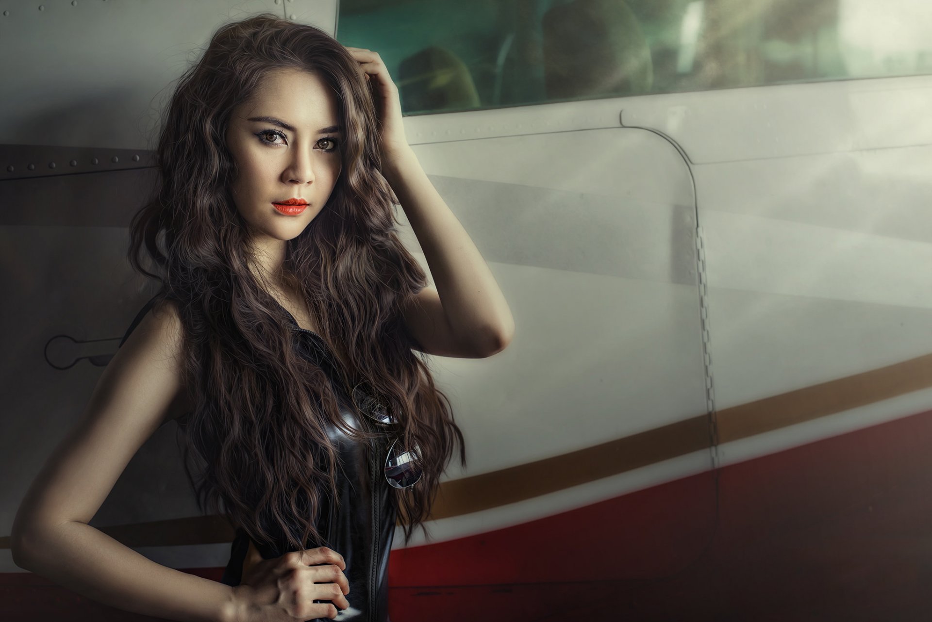 girl asian brunette hair view sunglasses plane