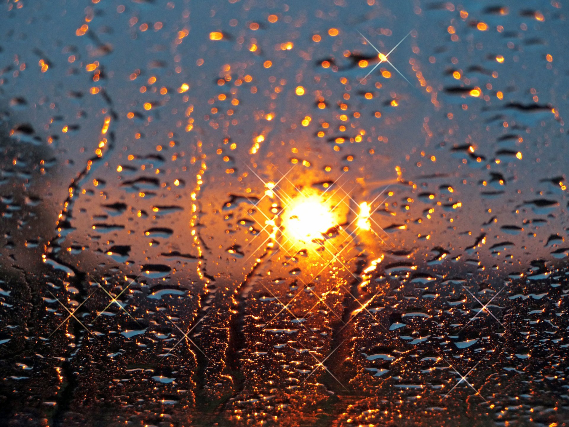 glass the sun drops sunset rain