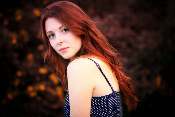 Beautiful redhead girl in black