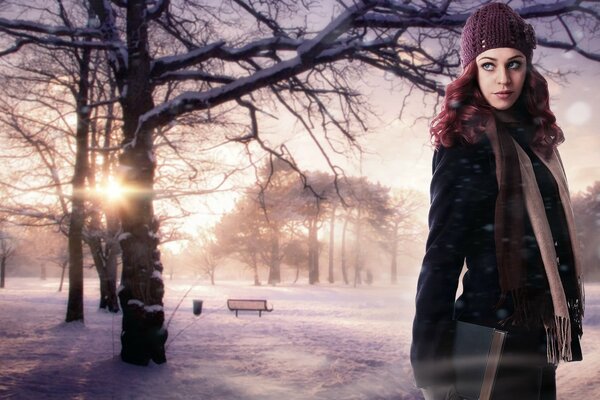 Beautiful girl on a winter background