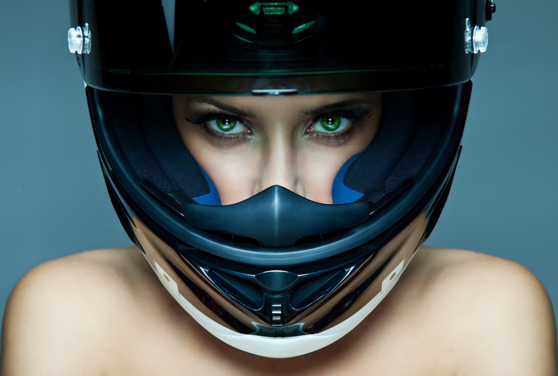 girl green eyes eyelash view face helmet shoulders background