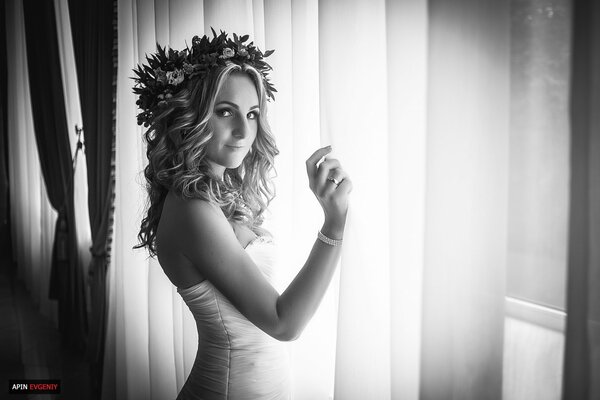 Black and white photo of a girl in a wreath