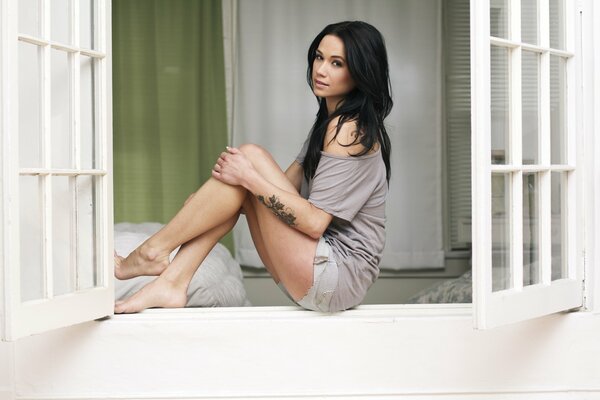 Photo shoot of model Megan Lin on the window