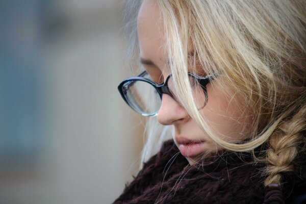 Girl with glasses, blonde , close up photo