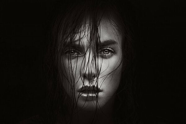 Black and white portrait of a girl with wet hair