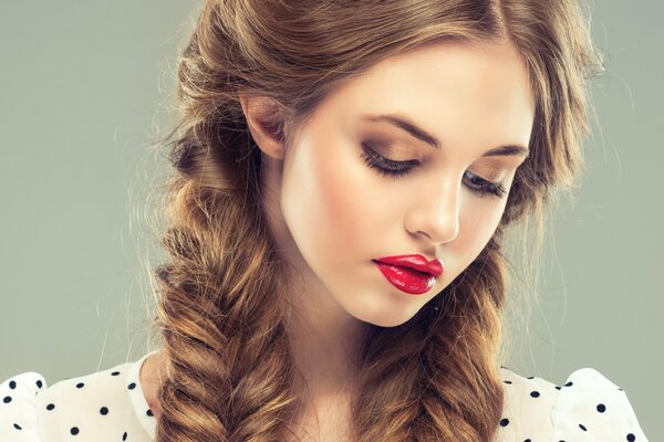 Girl with braids and red lipstick