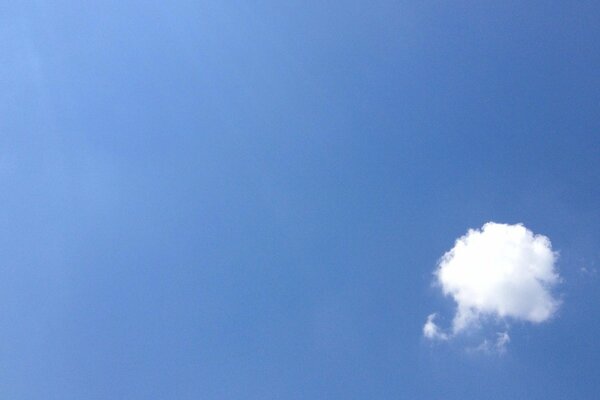 A small cloud in the blue sky