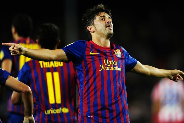 A football player from FC Barcelona gestures about losing