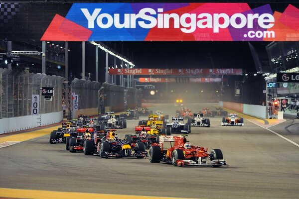 The beginning of the race of cars on the track