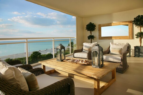 Interior in beige tones with wicker chairs