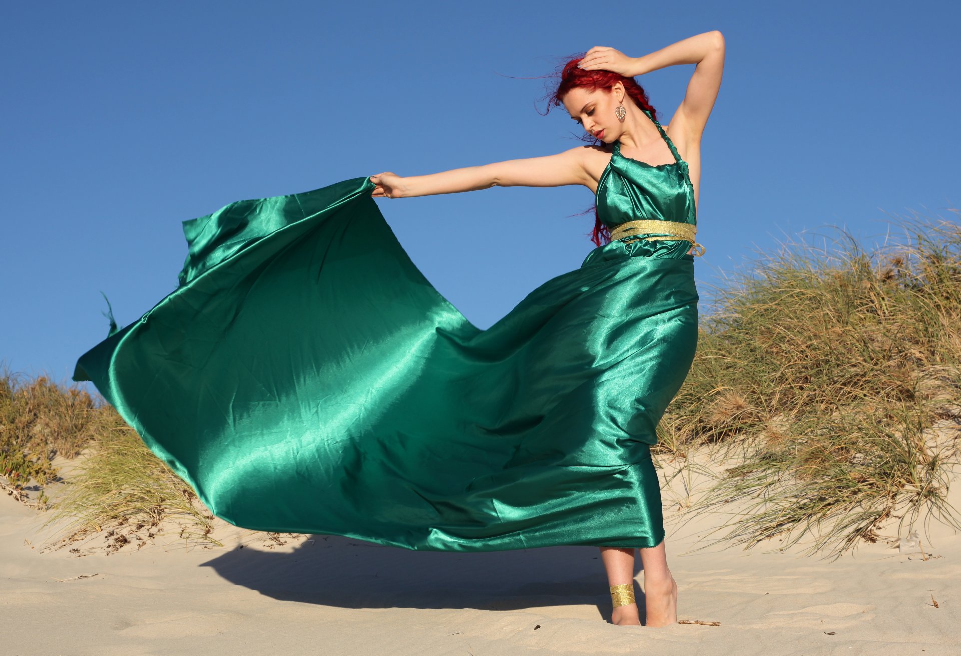 girl dress green flex cable pose red hair sand