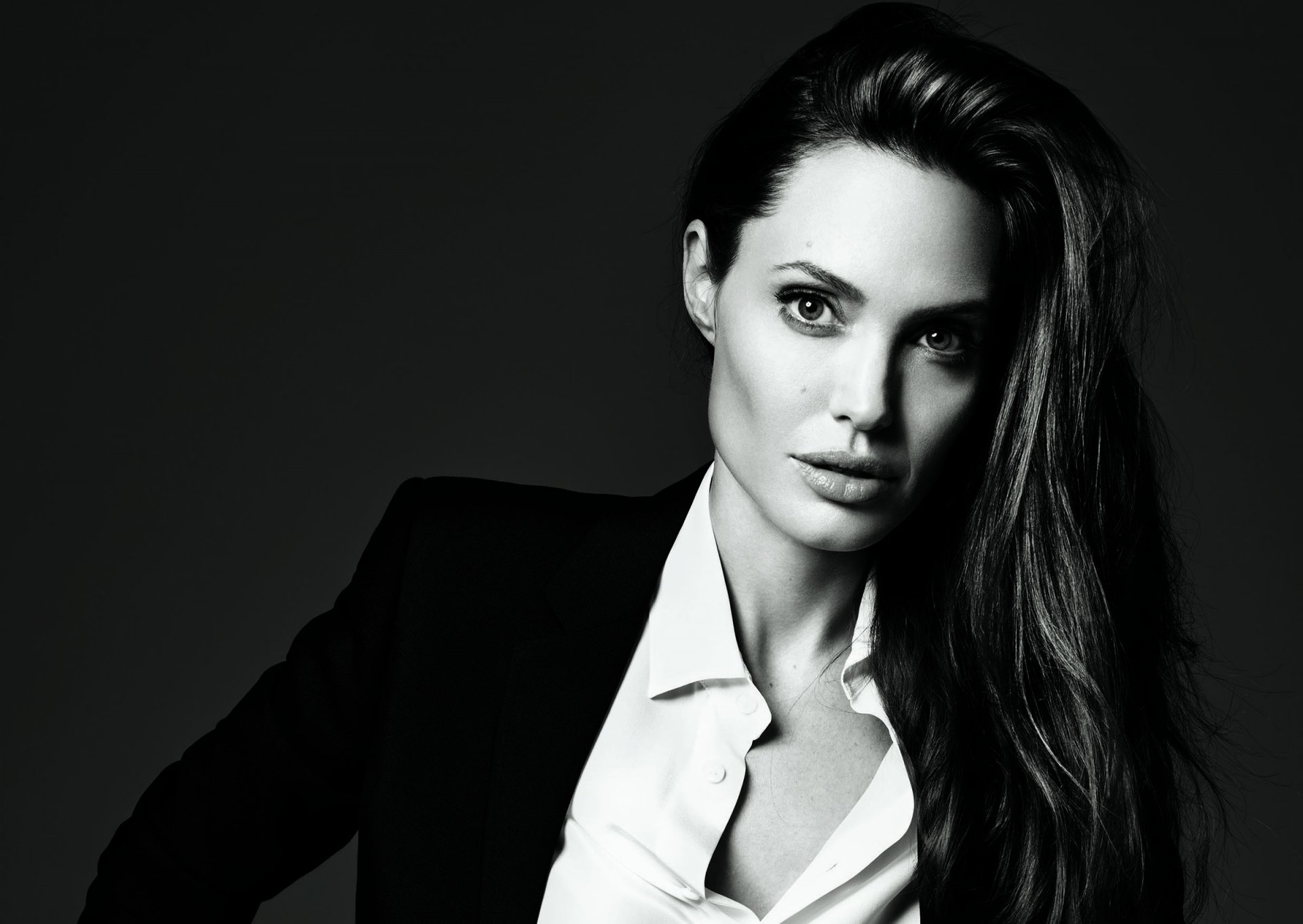 angelina jolie actress brunette face view jacket black and white