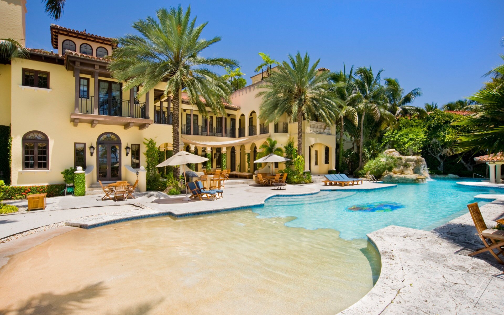 exterior villa home villa pool pool palm trees house exterior