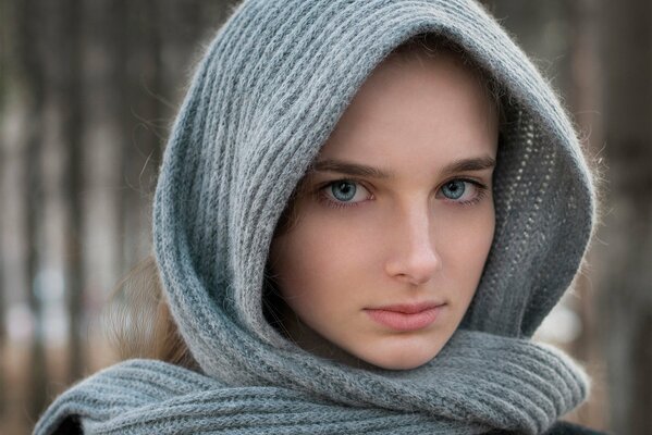 Portrait of a girl in a scarf on her head