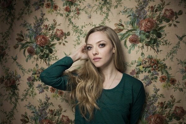 Amanda Seyfried in a green jacket