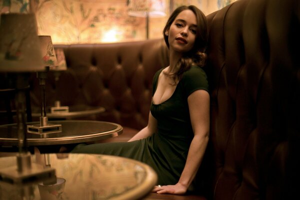 Emilia Clarke shows her breasts in a restaurant