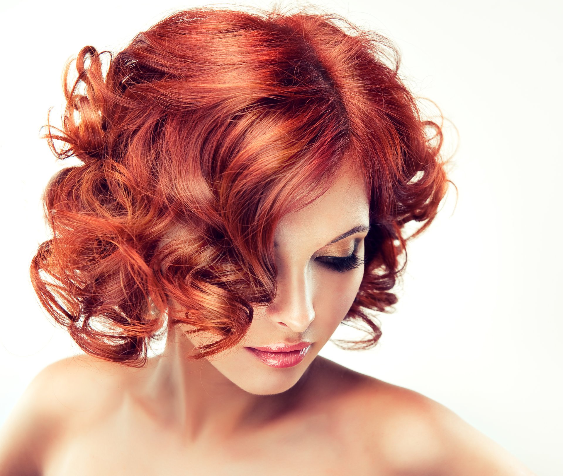 model red hair curls make-up lips shoulders white background