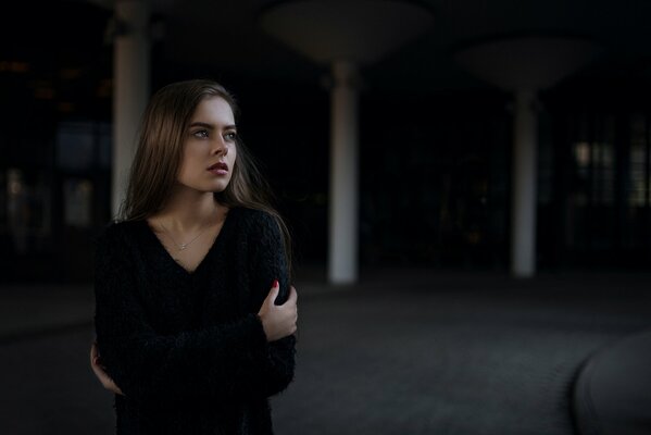 Portrait of a girl in a black sweater