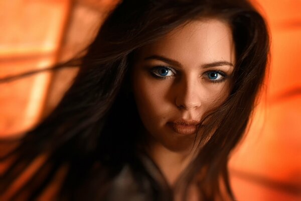 Beautiful brunette girl with blue eyes