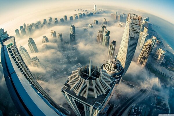 Skyscrapers from the height of clouds