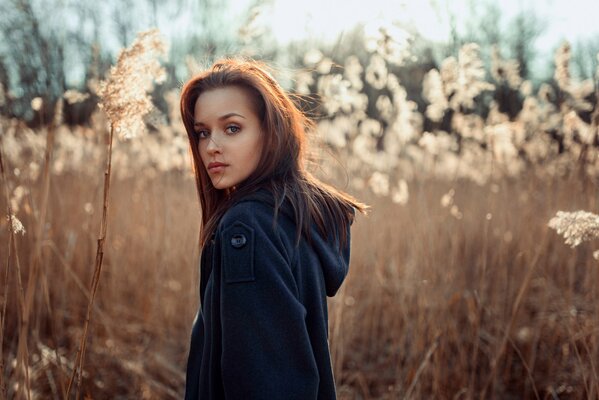 A stranger in a coat with a captivating look