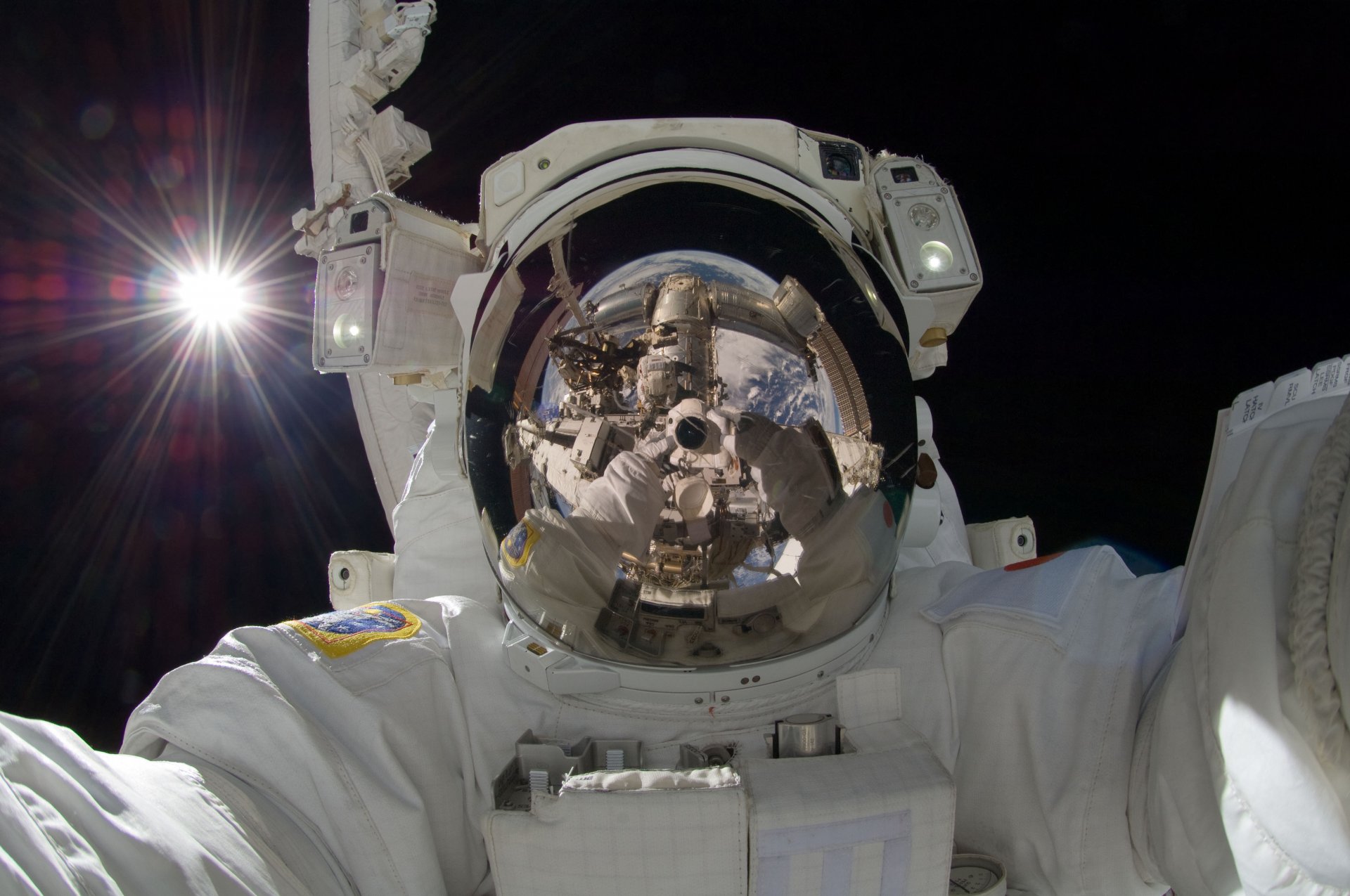 astronaut reflection self-portrait space land sun ray