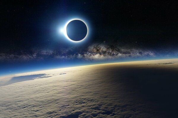Solar eclipse, view over clouds